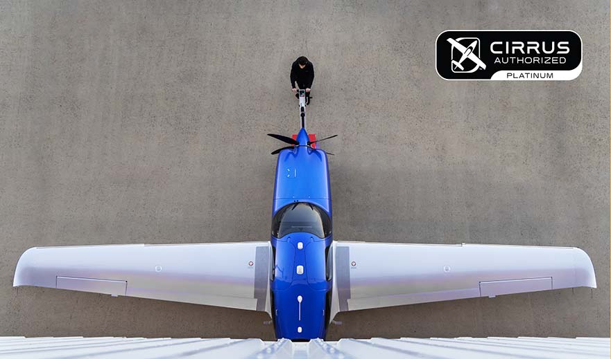 Cirrus SR20 seen from directly above, wings spread against the ramp
