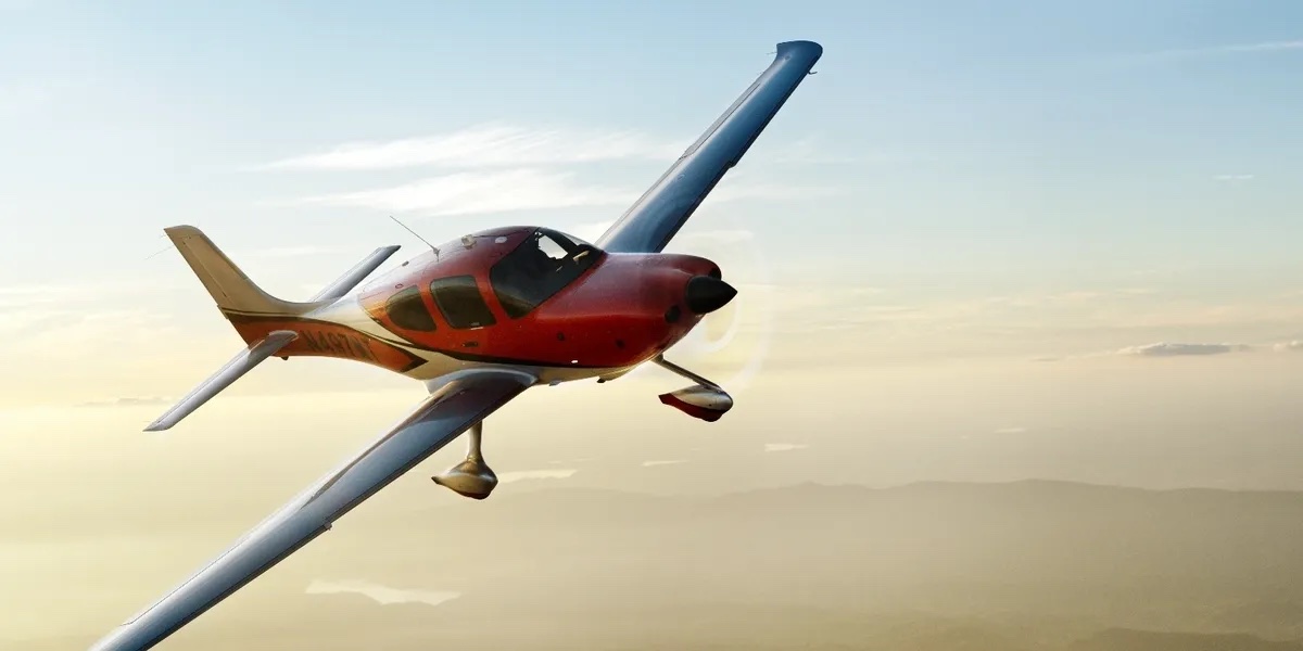 Cirrus banking above haze at golden hour